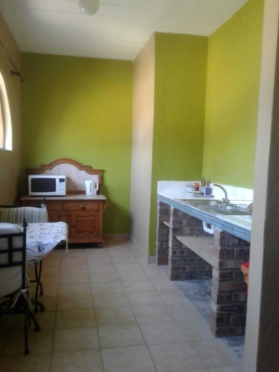 Comfort Studio | Private kitchenette | Microwave, stovetop, electric kettle, cookware/dishes/utensils