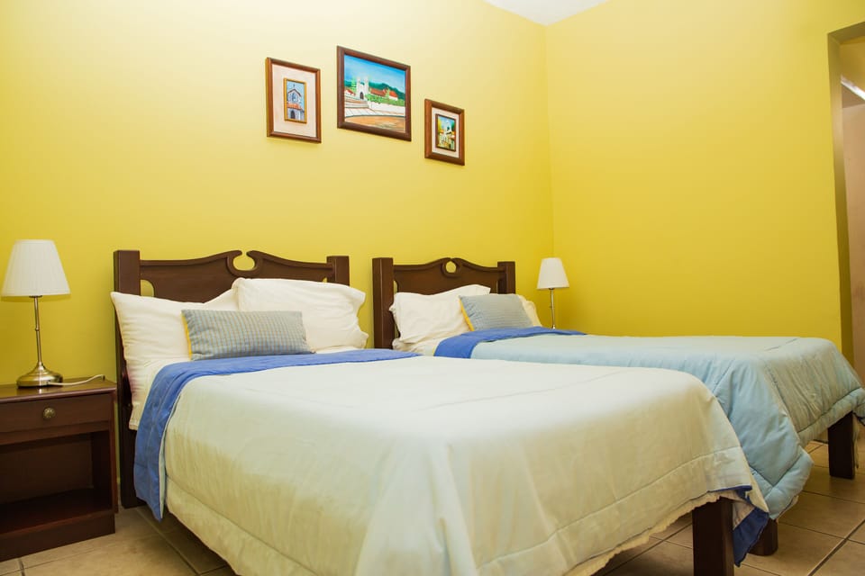 Economy Double Room, 2 Twin Beds | Hypo-allergenic bedding available, down comforters, blackout drapes