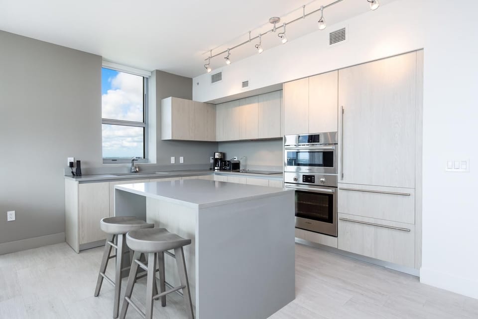 Create culinary magic in your sleek, fully-equipped kitchen space.

