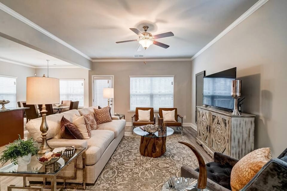 The living room and window with a view directly to the lake & open deck
