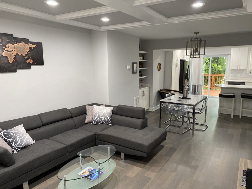 View of home from front door-living room, dining area and kitchen