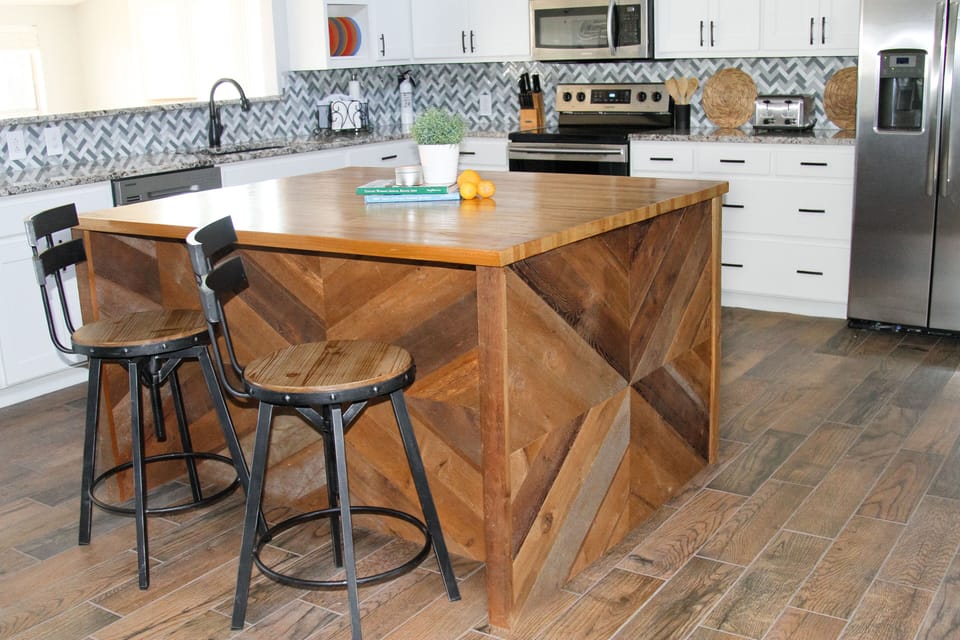 Large Kitchen. Stainless appliances. Granite counters. Big island. Lake views.