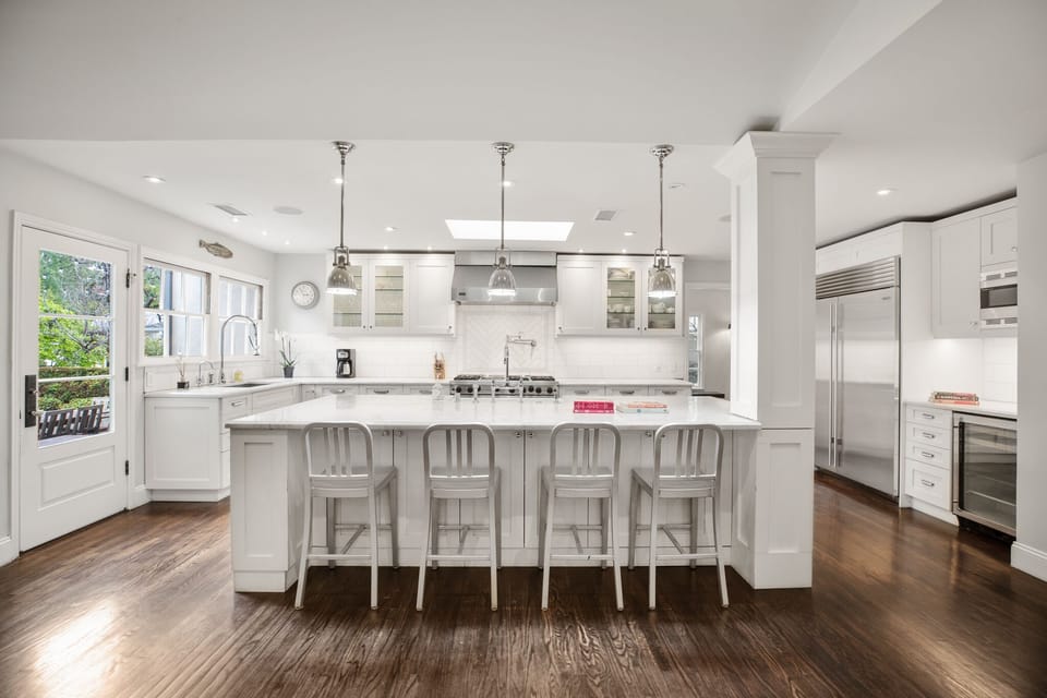 View of kitchen from great room. Watch some TV while cooking or enjoy the quiet.