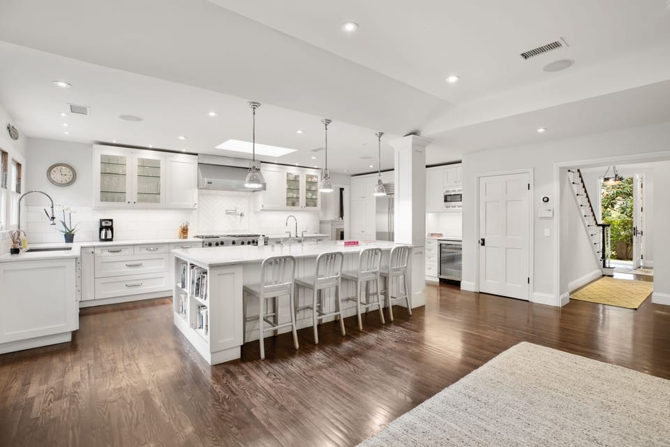 Gleaming wood floors in expansive kitchen