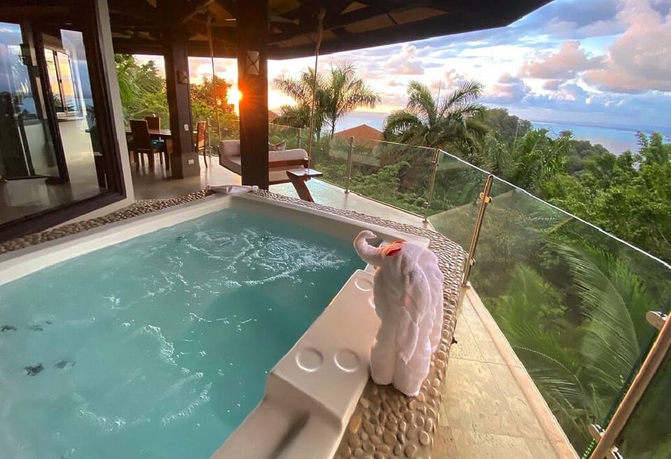 Outdoor Jacuzzi on balcony with ocean view