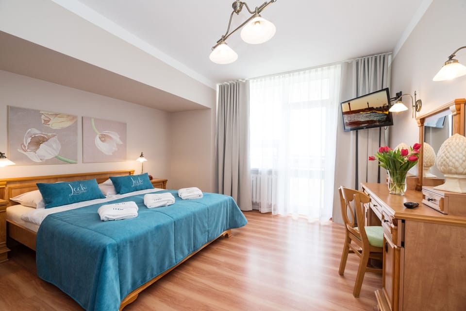 Studio Suite | Individually decorated, individually furnished, desk, iron/ironing board