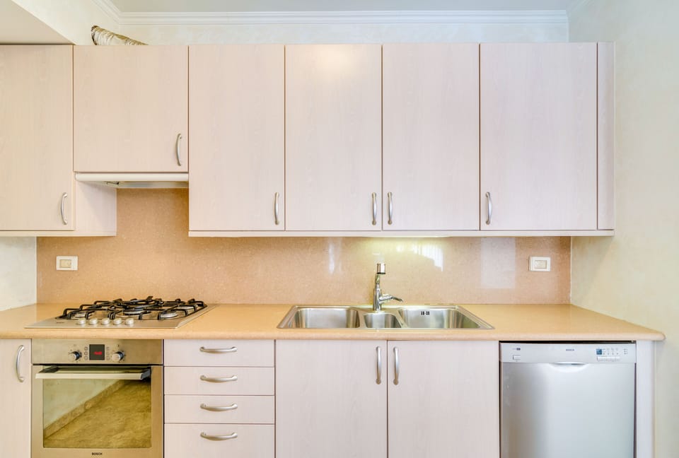 Luxury Apartment | Private kitchen | Full-size fridge, microwave, oven, stovetop