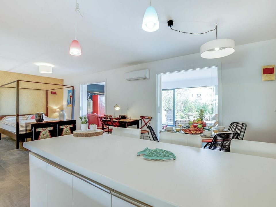 Table, Furniture, Property, Cabinetry, Plant, Lighting, Houseplant, Chair, Interior Design, Building