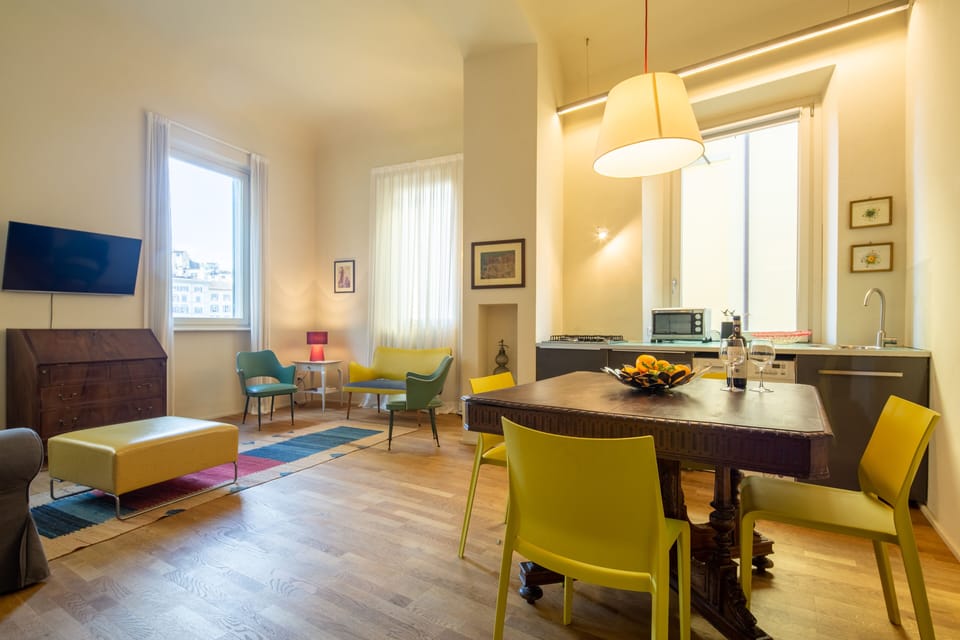 Deluxe Apartment, 3 Bedrooms | Living room | Flat-screen TV