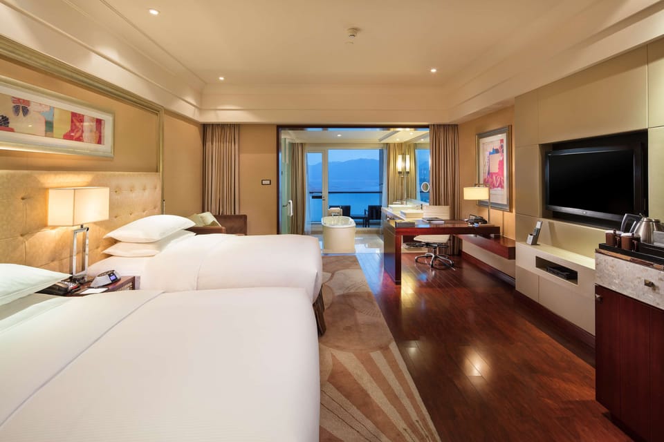 Premium bedding, down comforters, minibar, in-room safe
