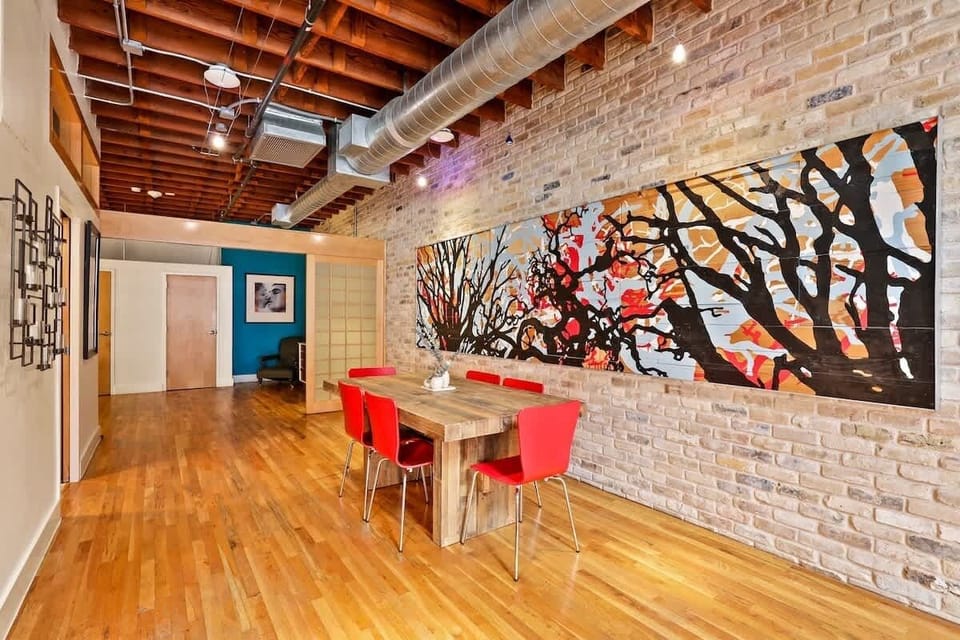 Corporate travelers and families will enjoy the large 6 person dining table in the back hallway.