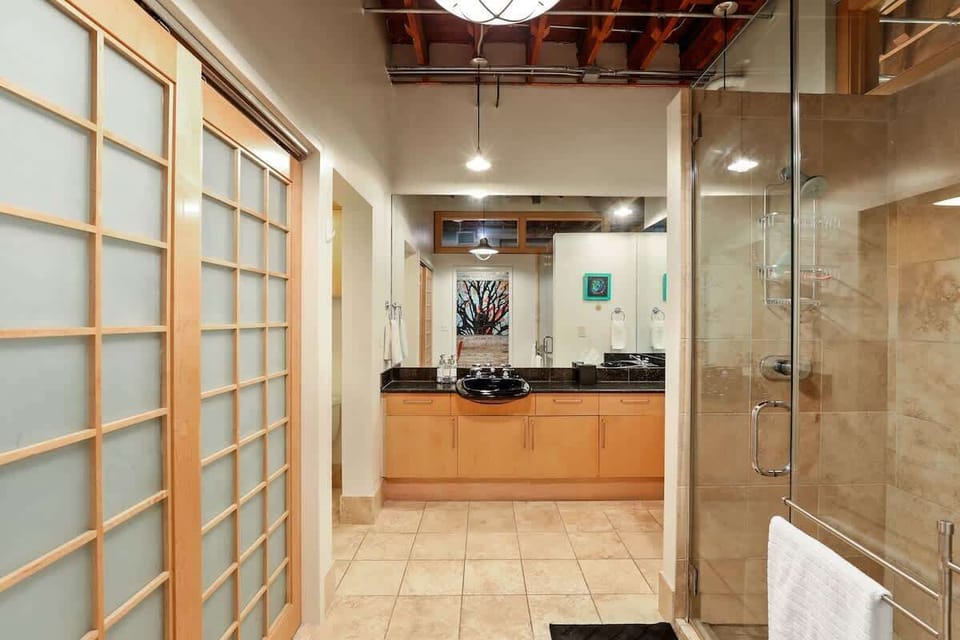 Bathroom 2 also features a double vanity and walk-in shower.