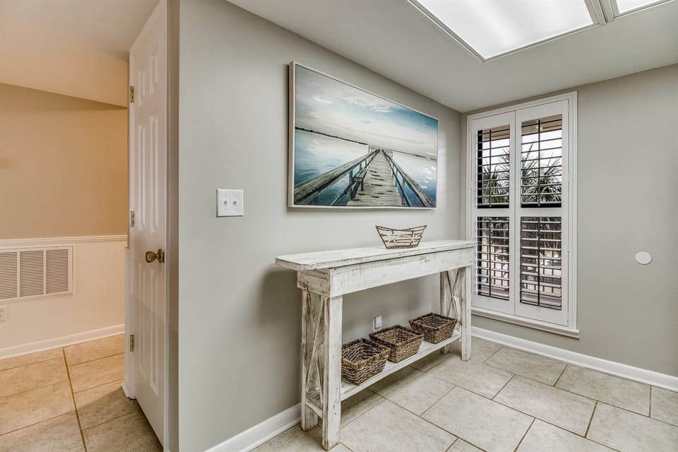 Kitchen with separate dressing area adjacent at Wind Drift Orange Beach
