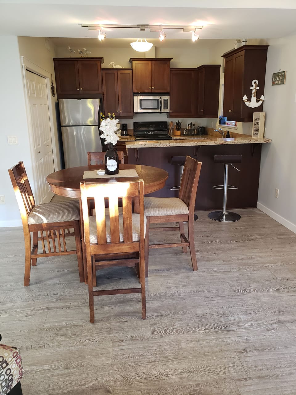 View of kitchen and table from living room