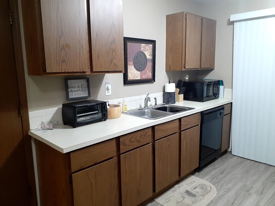 Toaster oven, microwave, clean appliances and cookware.....
