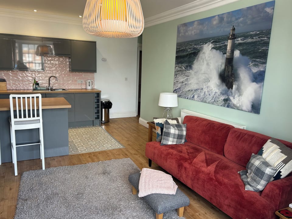 Cottage | Living area | TV, fireplace