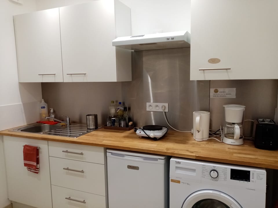 Mini-fridge, microwave, coffee/tea maker, electric kettle
