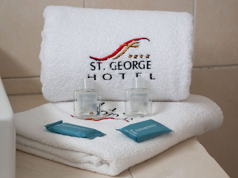 Shower, rainfall showerhead, towels, soap