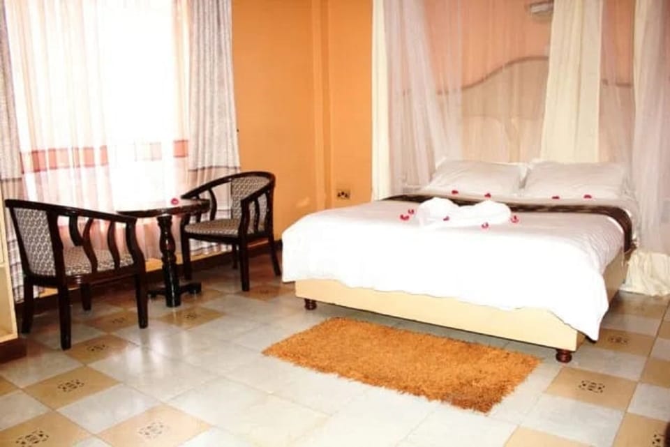 Standard Double Room | Desk, blackout drapes, iron/ironing board, free WiFi