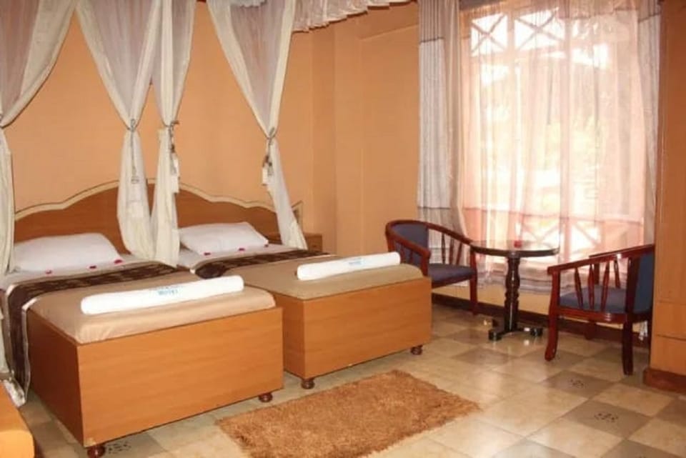 Standard Twin Room | Desk, blackout drapes, iron/ironing board, free WiFi