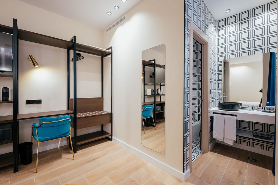 Down comforters, memory foam beds, minibar, in-room safe