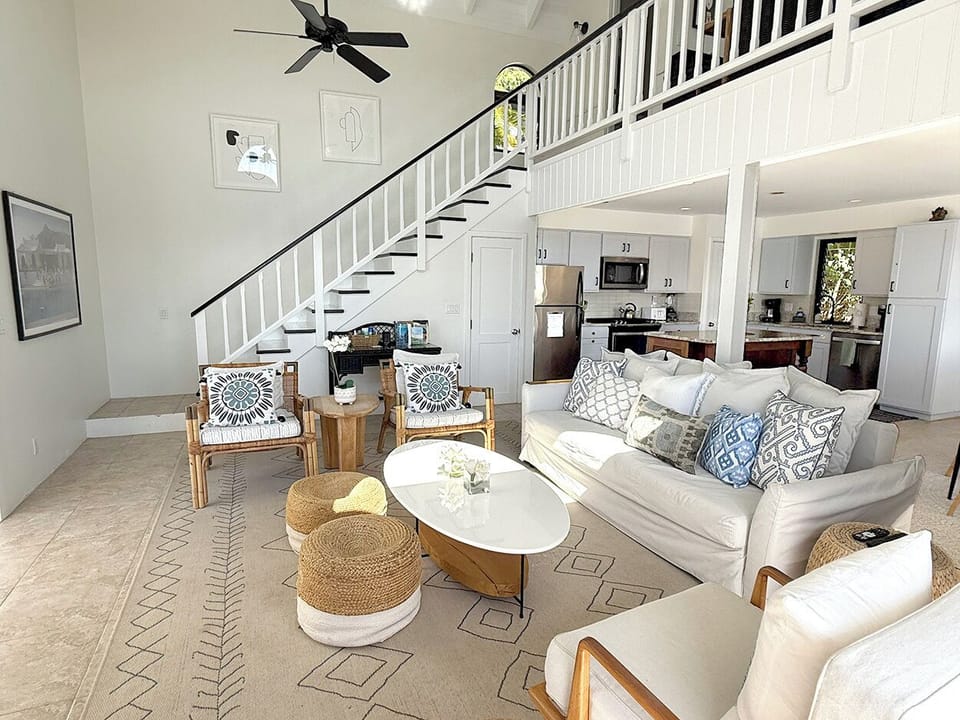 Your living room looking towards the stairway up to the loft