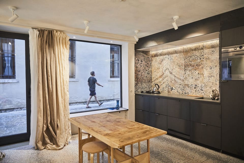 Kitchen made from recuperated marble from an ancient Abbey near San Marco