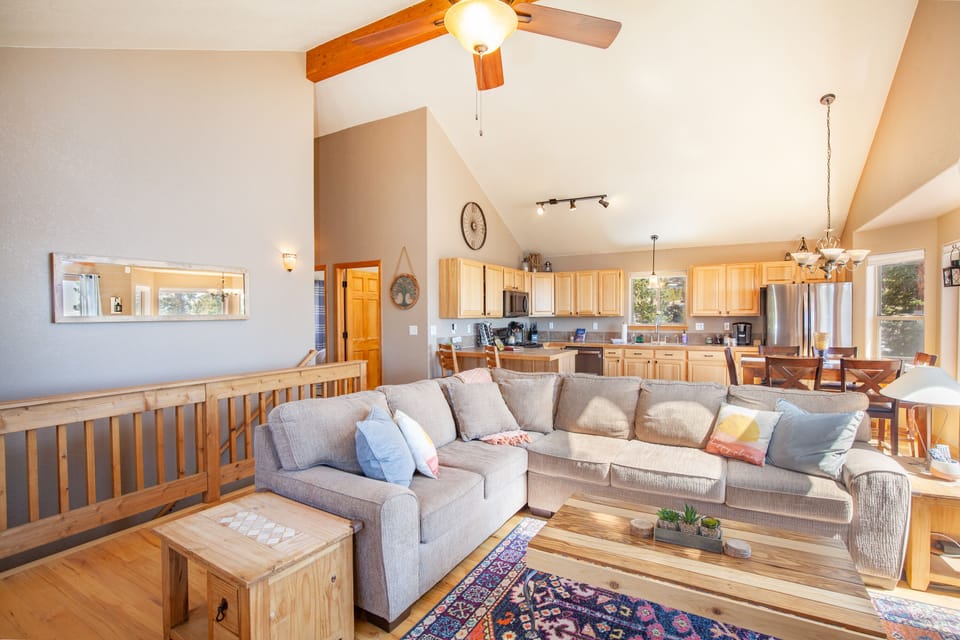 Relax on the 6 person sectional, and watch a movie or enjoy the views.