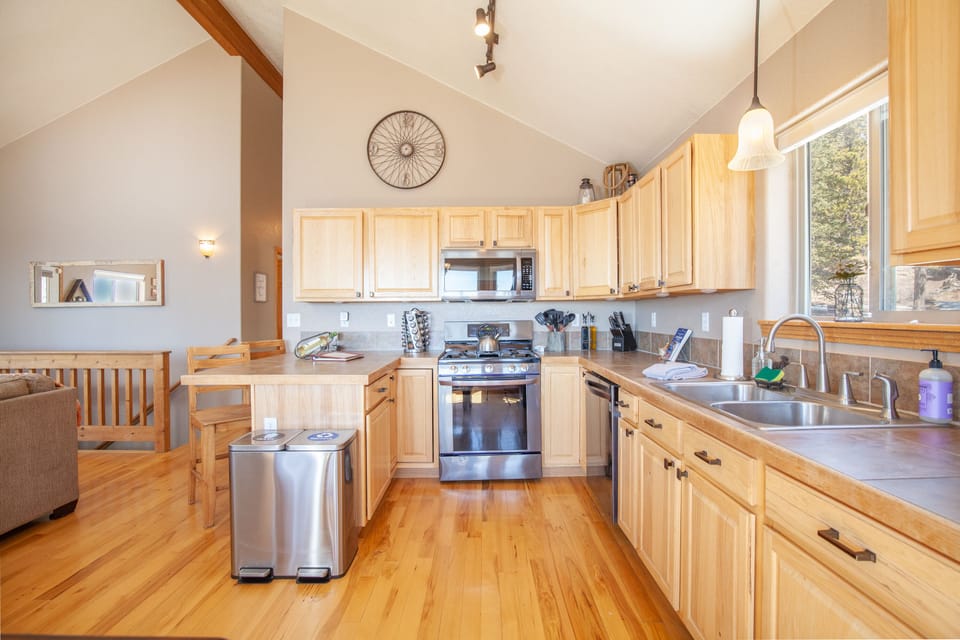 Fully stocked kitchen with gas range
