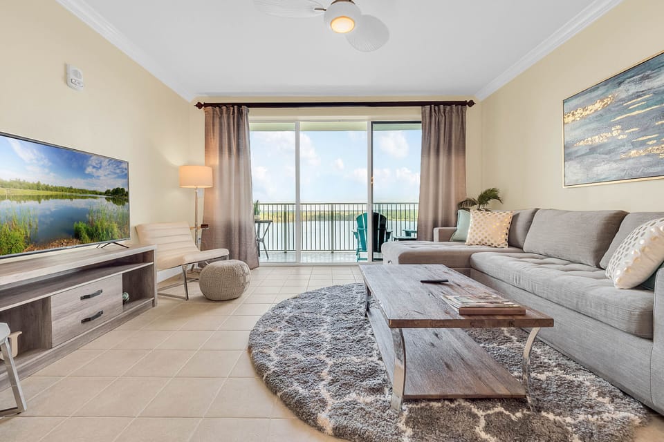 Modern decor and floor to ceiling views of Lake Bryan.
