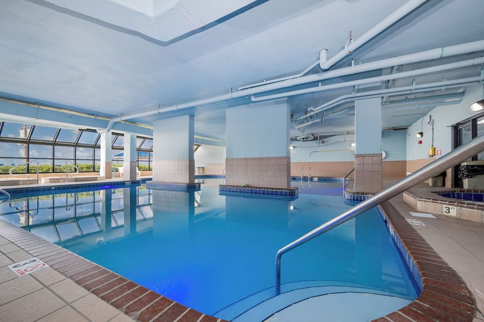 Cool off in the indoor pool with stunning views at Phoenix V, perfect for a refreshing swim after a day at the beach
