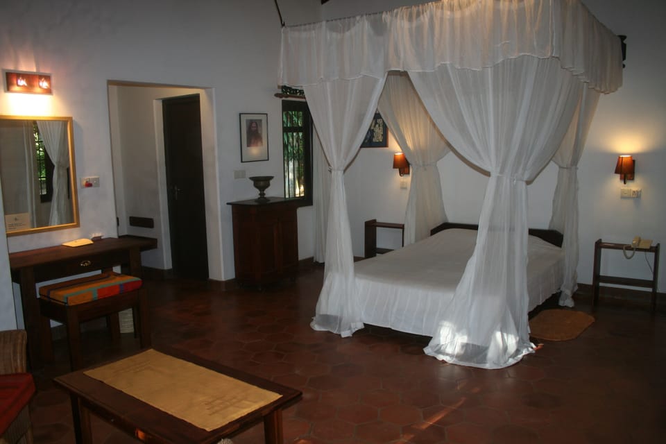 Desk, blackout drapes, bed sheets