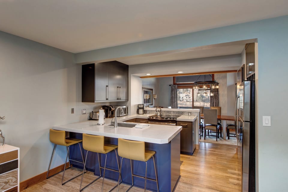 Bar Seating for 3 with Adjoining Family Room