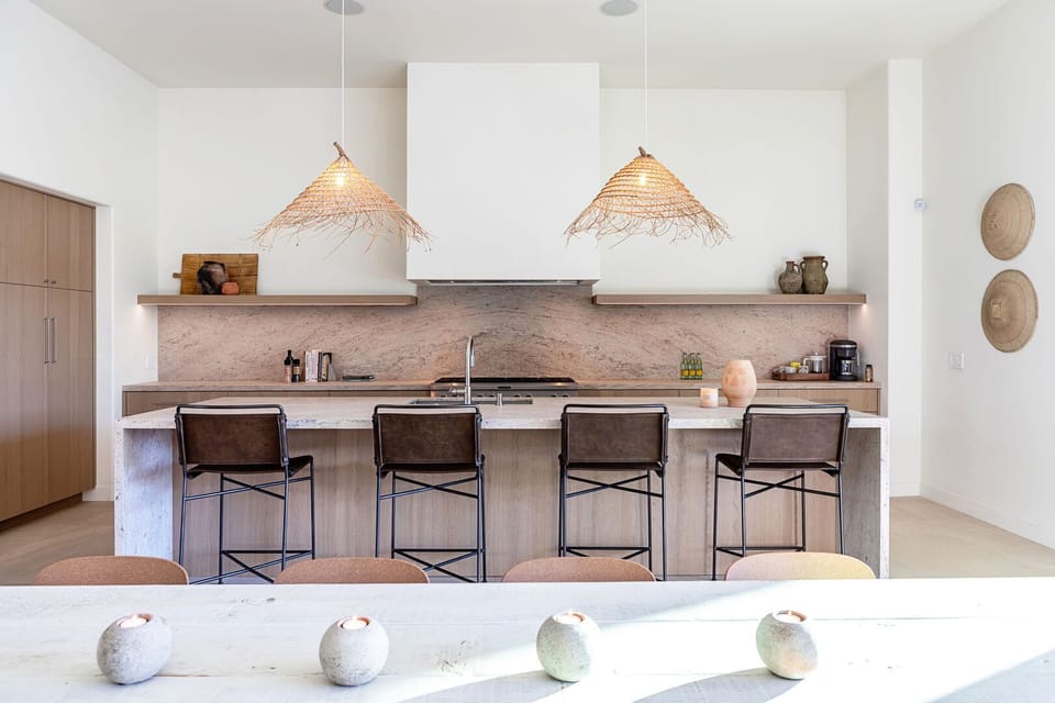 Stylish newly renovated kitchen with large granite waterfall island