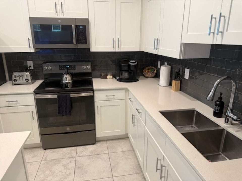 Sleek kitchen with stainless steel appliances