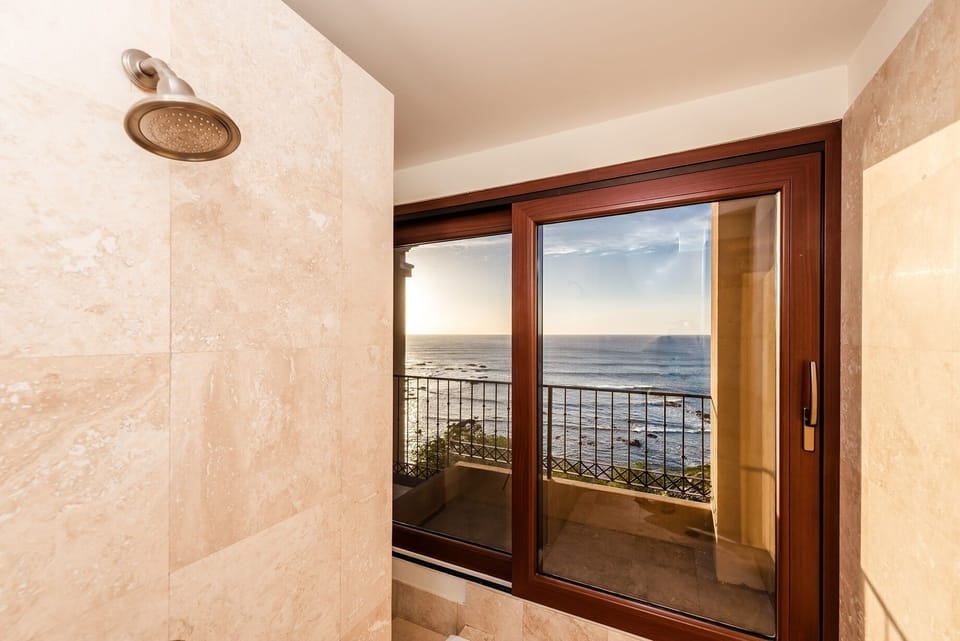 Shower with the ocean view and breeze.