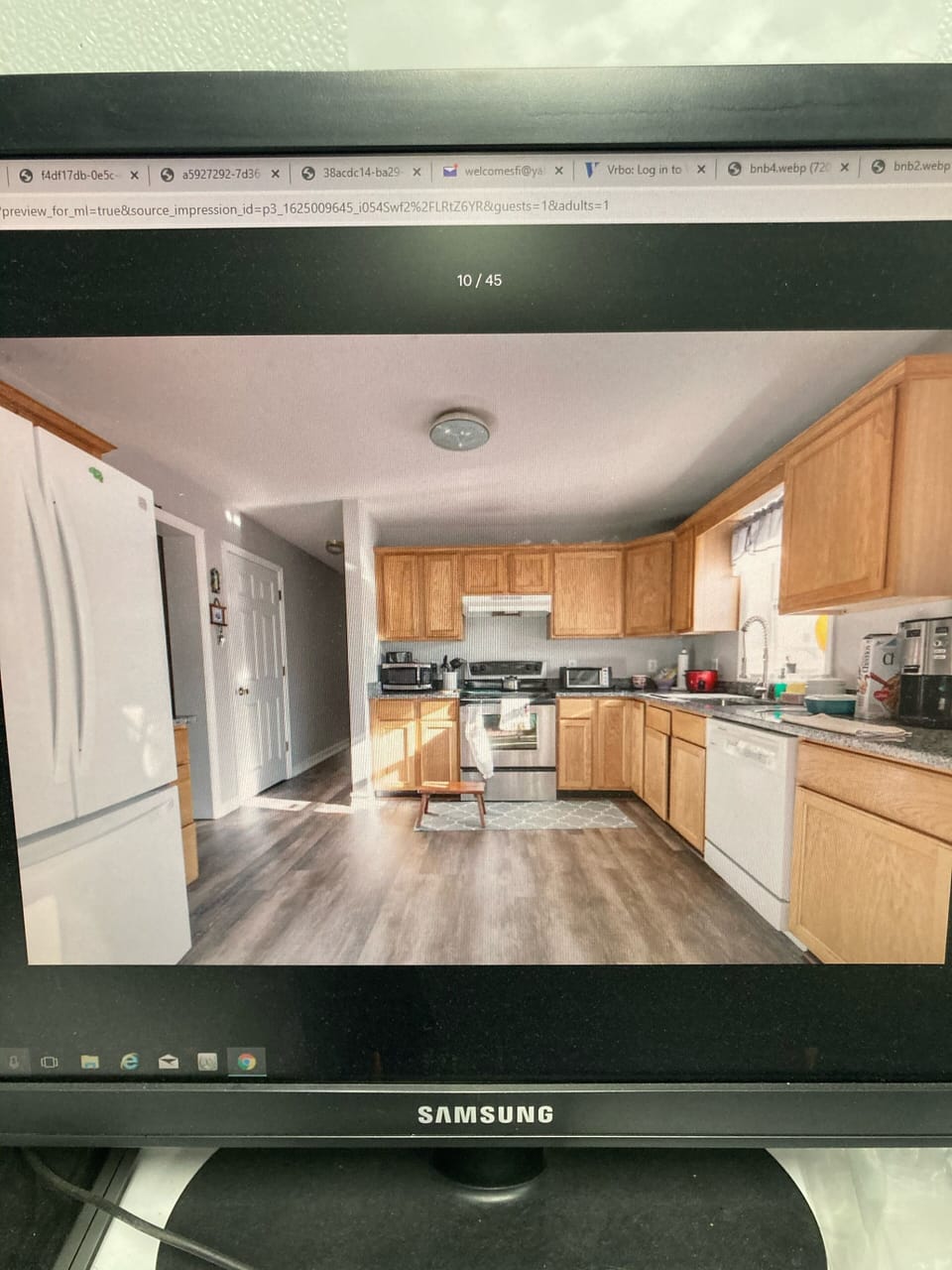 Kitchen, with refrigerator on the left