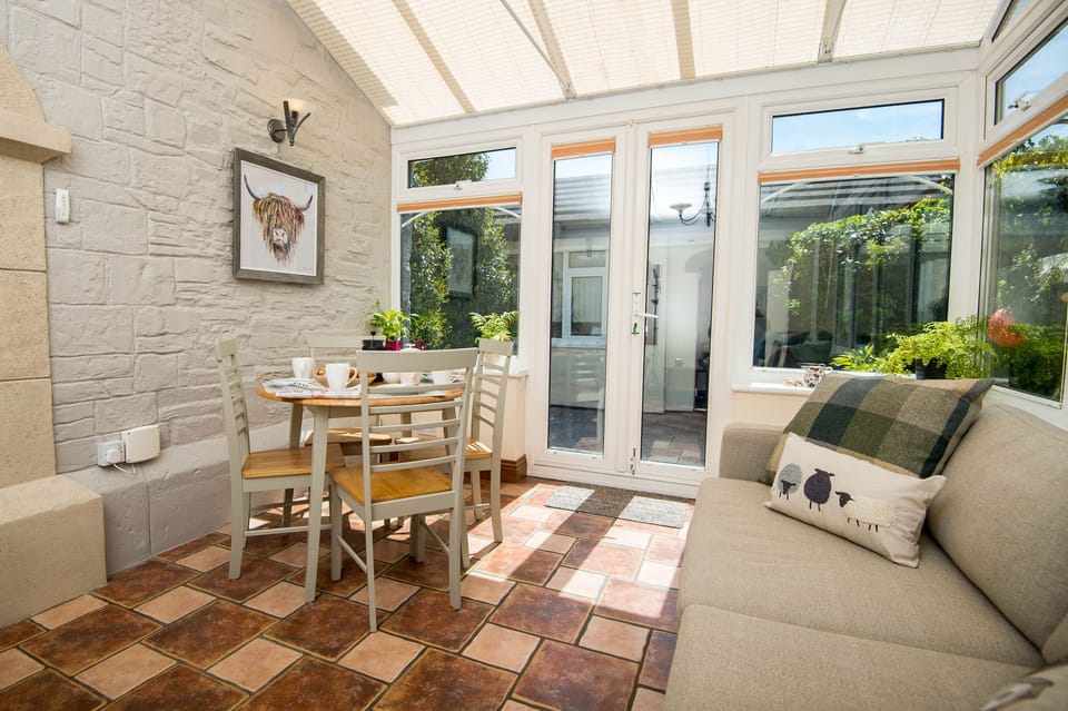 conservatory with breakfast table