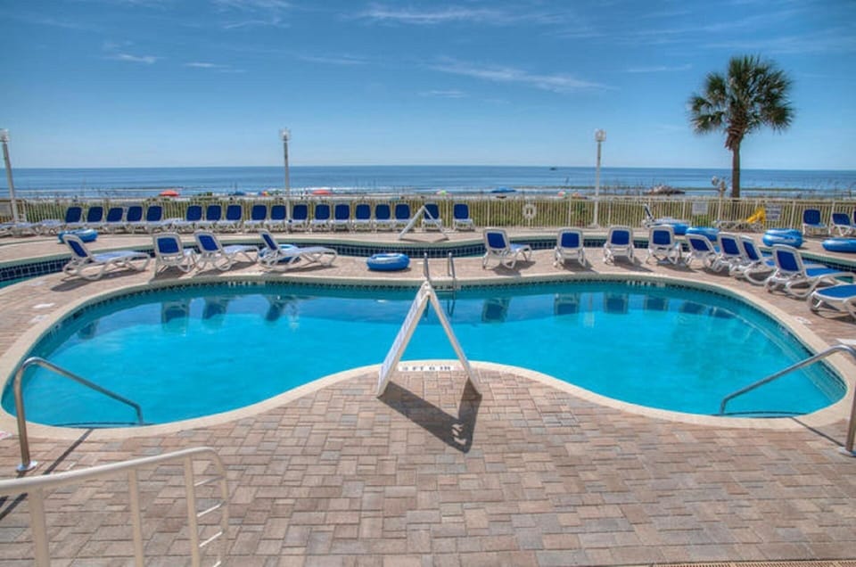 Catch some rays while the kids swim and play.