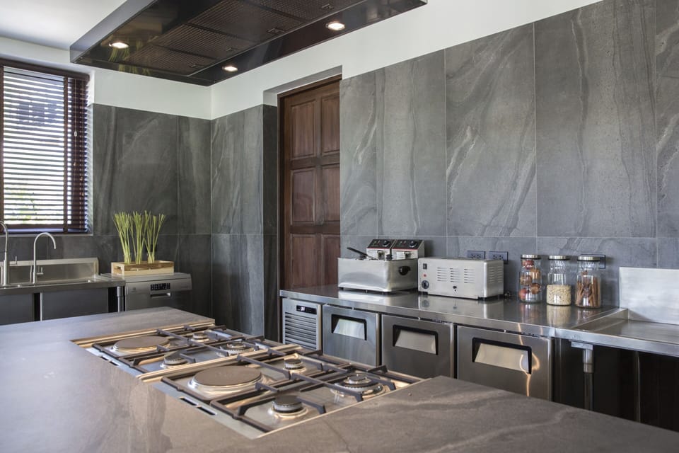 Deluxe Villa | Private kitchen | Full-size fridge, microwave, oven, stovetop