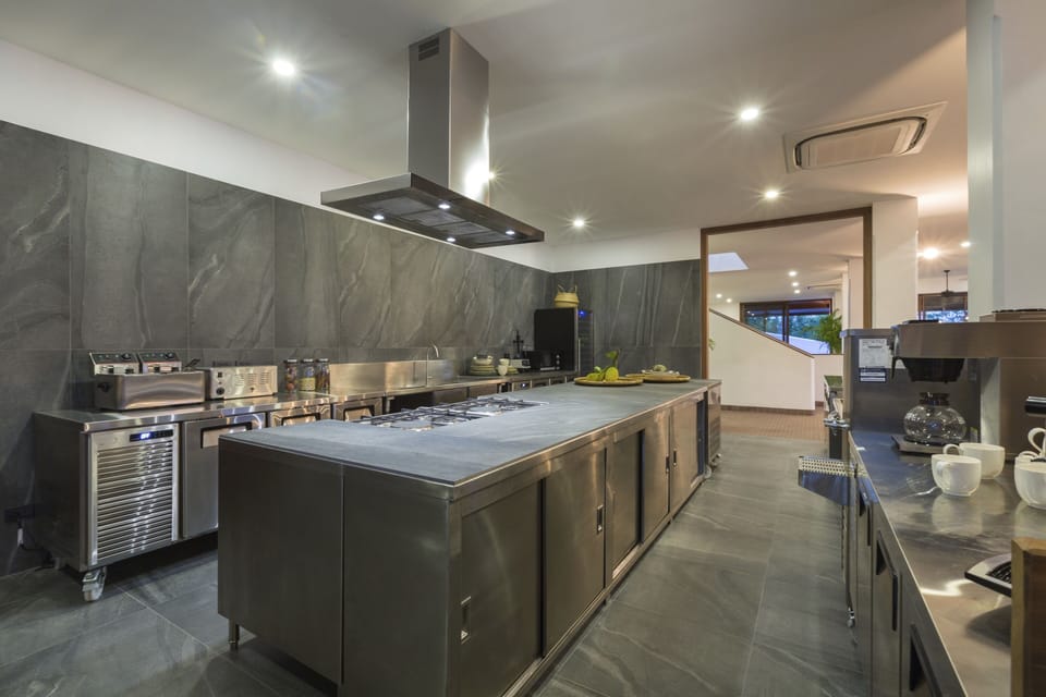 Deluxe Villa | Private kitchen | Full-size fridge, microwave, oven, stovetop