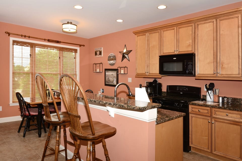 Breakfast bar is a great spot to sit and keep the cook company!
