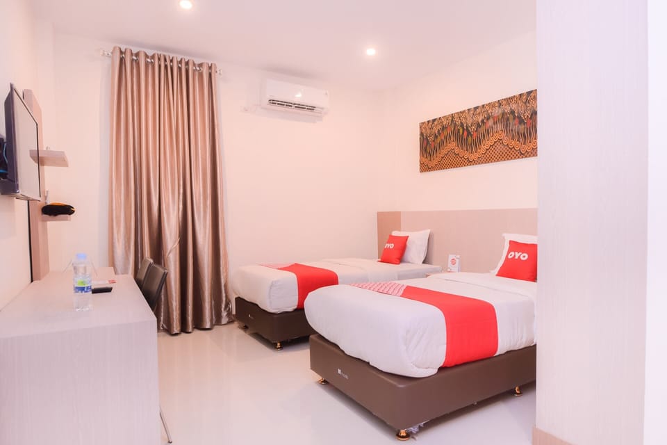 Deluxe Twin Room | Desk, WiFi (free), bed sheets