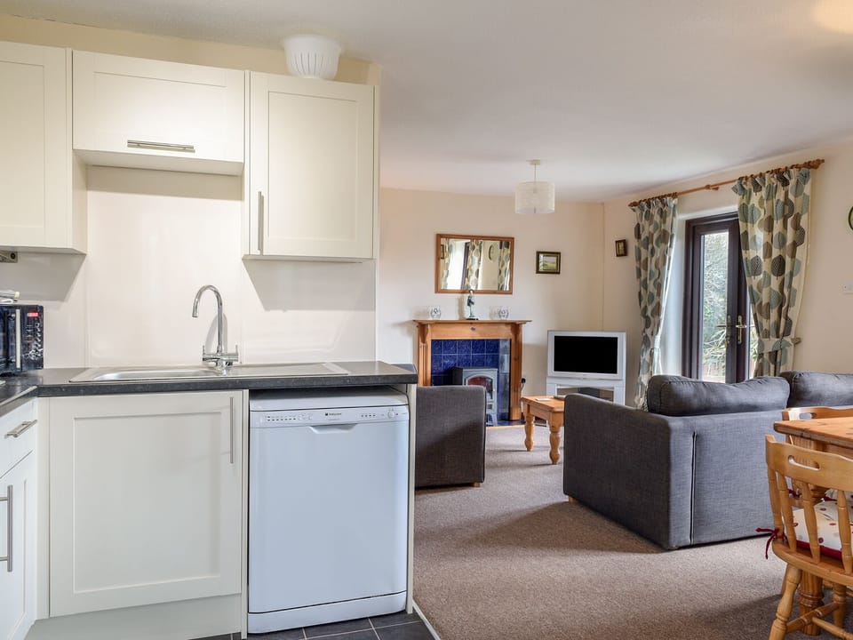 Cottage | Private kitchen | Microwave, stovetop, dishwasher, highchair