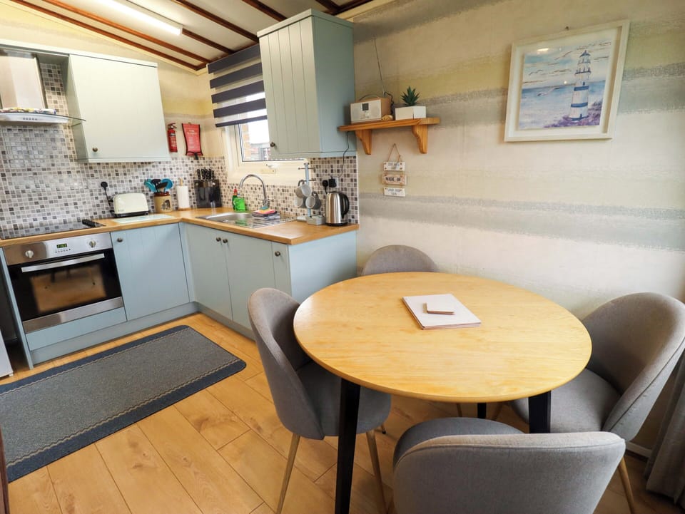 Fridge, microwave, electric kettle, cookware/dishes/utensils
