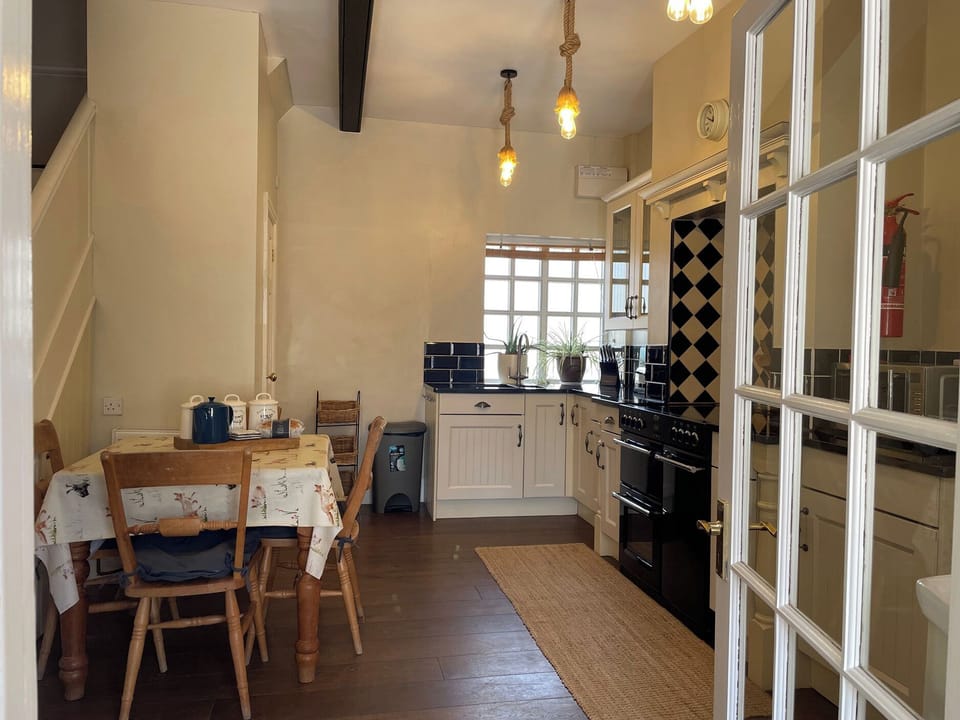 Cottage | Private kitchen | Highchair, cookware/dishes/utensils