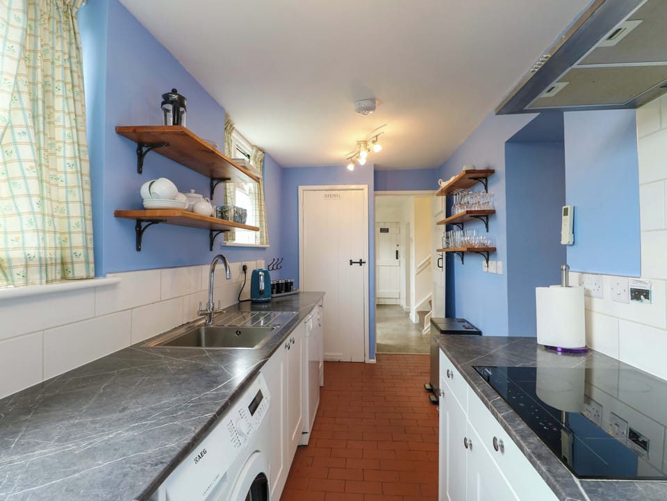 Fridge, dishwasher, highchair, cookware/dishes/utensils