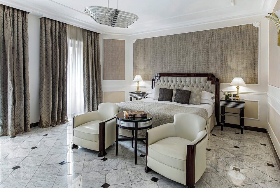 Premium bedding, down comforters, minibar, in-room safe