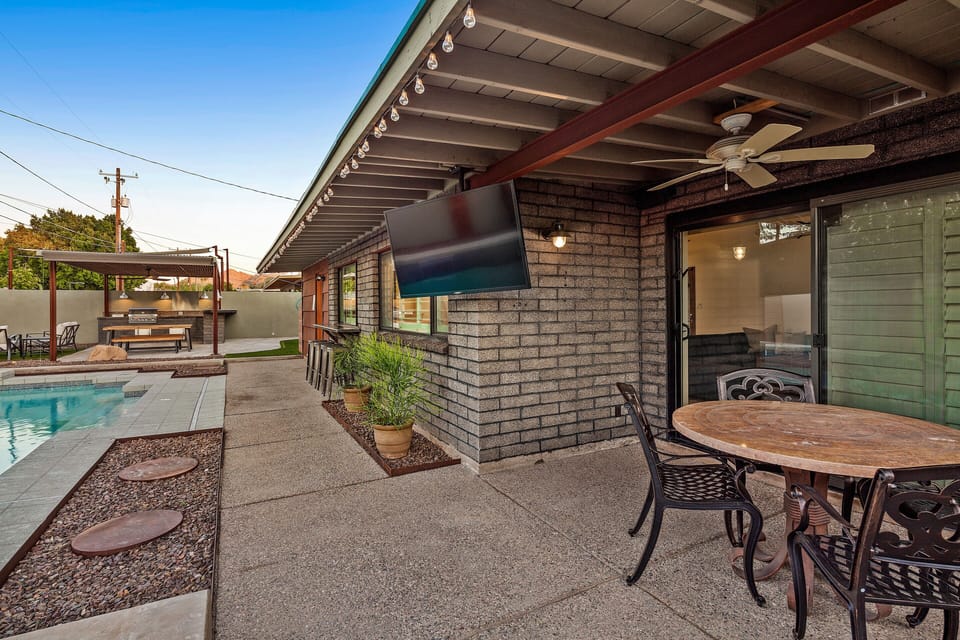 Outdoor TV to enjoy show/movie/sports game while relaxing in pool or by the fire