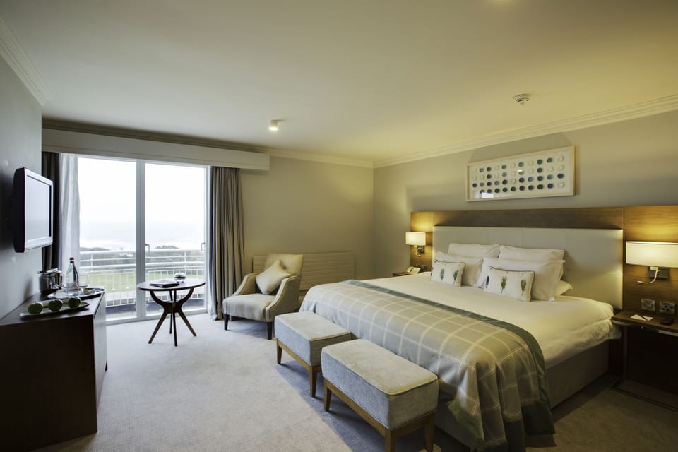 Junior Suite, Sea View | Premium bedding, down comforters, pillowtop beds, in-room safe